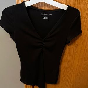 Women’s black bodysuit tee